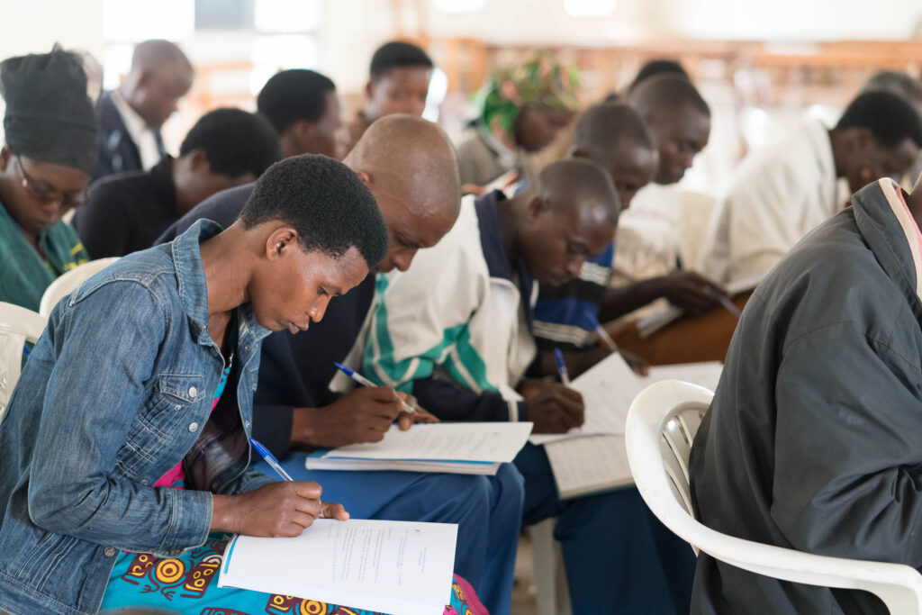 Student pastors writing notes